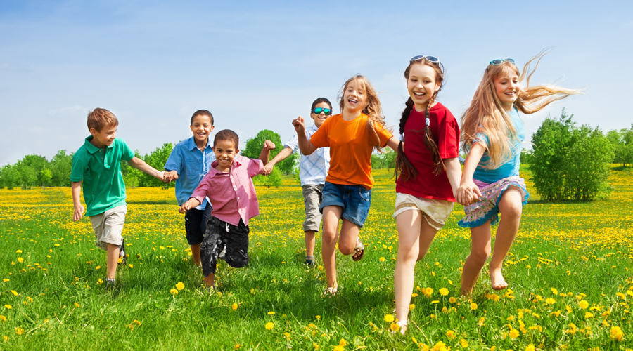 Children playing in field